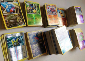 250 Assorted Pokemon Cards with Rares and Foils.